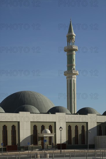 Ornate spire and dome building under blue sky