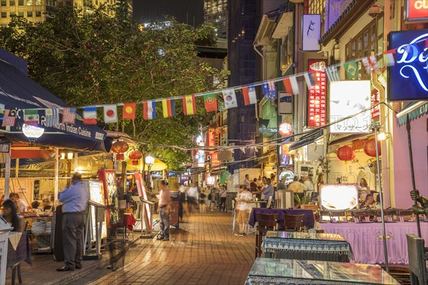 Outdoor vendors on Singapore sidewalk