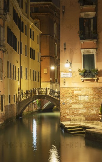 Bridge over Venice canal at night
