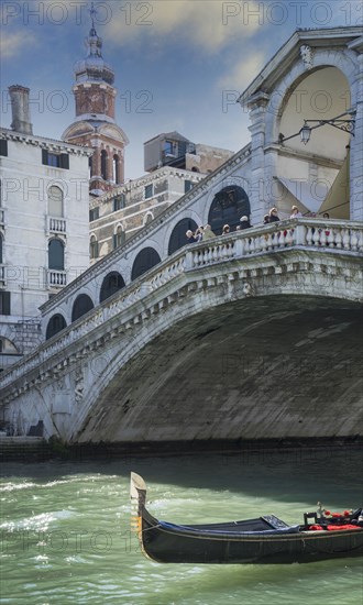 Empty gondola sailing on Venice canal