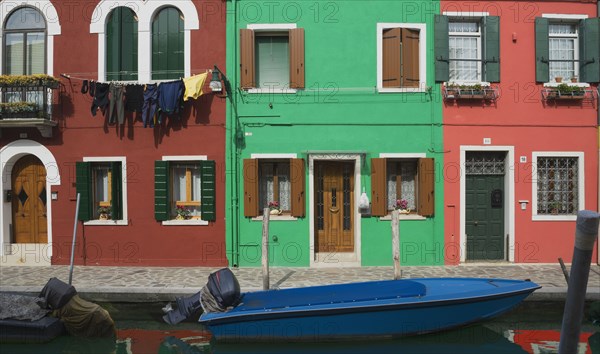 Gondolas parked in Venice Burano canal
