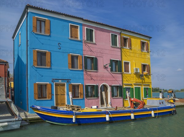 Gondolas parked in Venice Burano canal