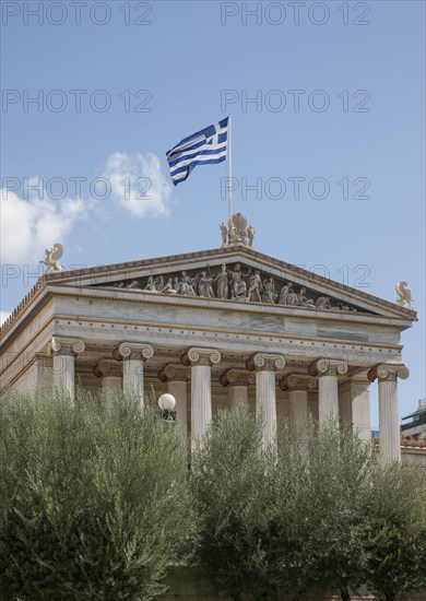 Academy building under blue sky