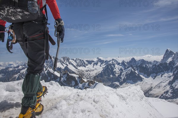 Caucasian hiker on mountaintop