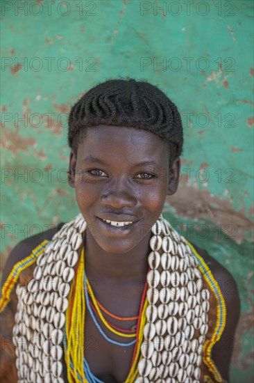 Black woman wearing traditional jewelry