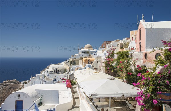 Santorini cityscape under blue sky