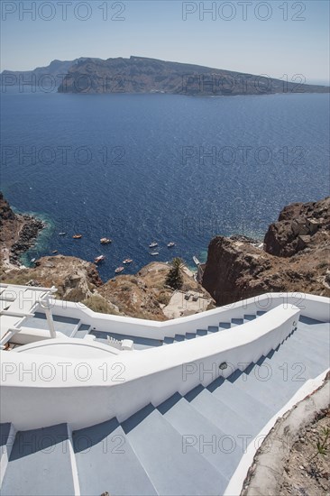 High angle view of hillside steps over ocean