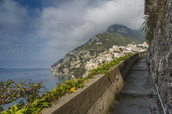 Rocky balcony overlooking Positano cityscape