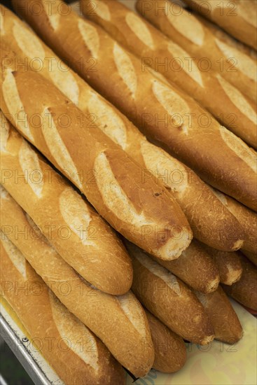 Close up of pile of baguettes
