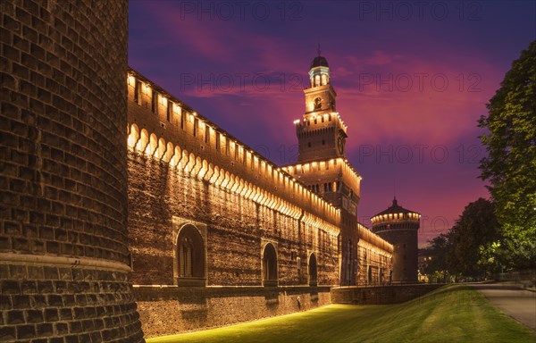 Illuminated tower and castle walls