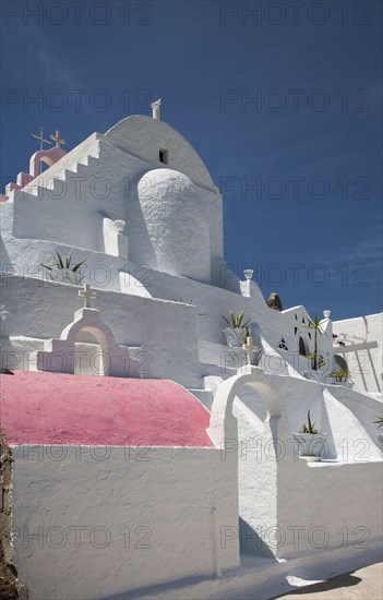 Low angle view of traditional building under blue sky