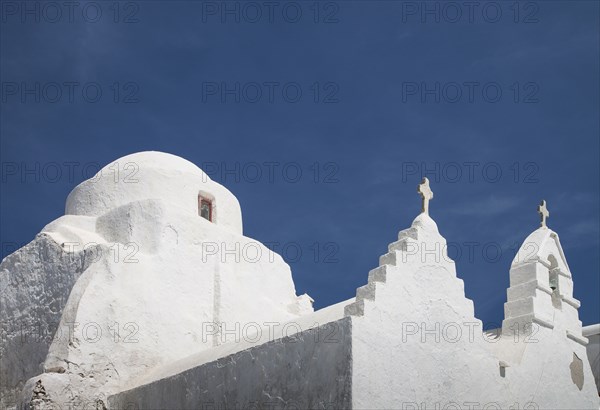 Low angle view of traditional building under blue sky