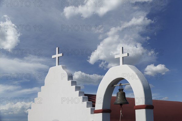 Low angle view of crosses on traditional roof