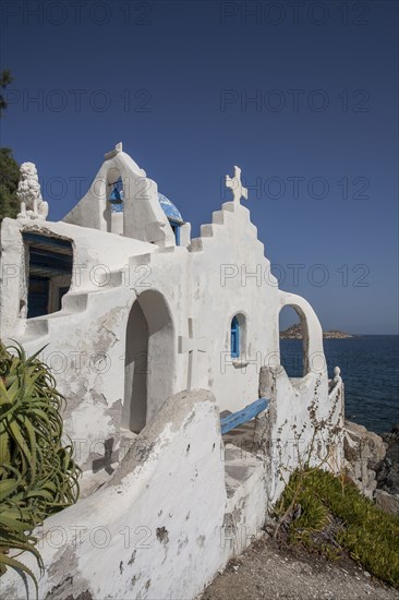 Traditional church on rocky oceanfront