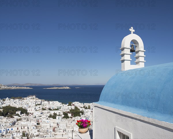 Traditional church and Mykonos cityscape
