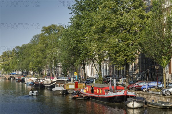 Ornate building and boats along canal