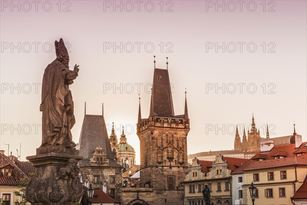 Statue and ornate buildings in cityscape