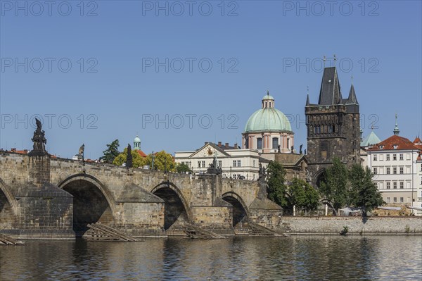 Buildings and bridge over Prague waterfront
