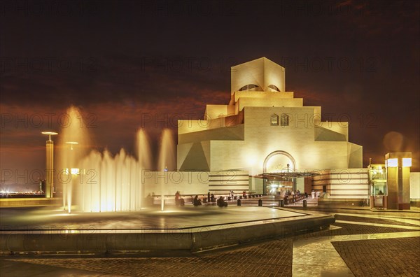 Doha Museum of Islamic Art illuminated at night