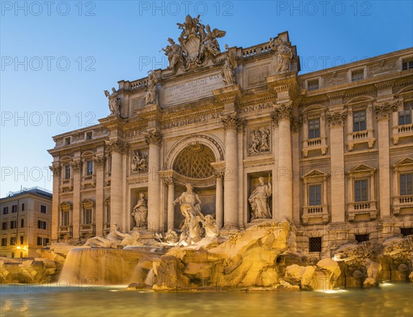 Trevi Fountain under ornate building