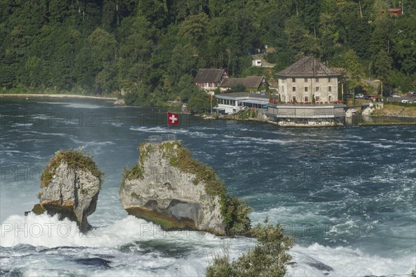 House on rocky river