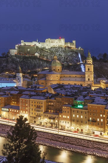 Aerial view of Salzburg cityscape illuminated at night