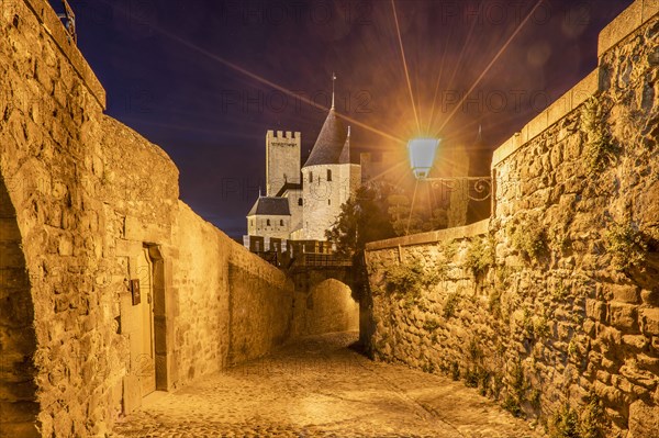 Street lamp on walkway to castle in Carcassonne