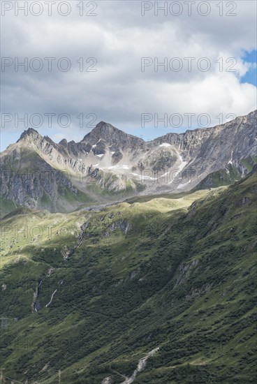 Clouds over mountain landscape