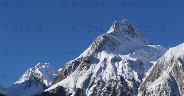 Snow on mountain range