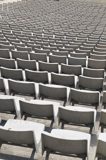 Empty chairs in stadium