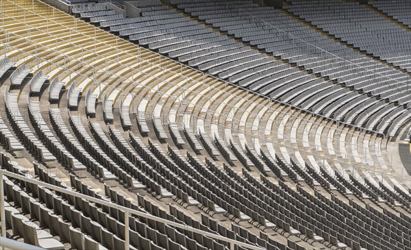 Empty chairs in stadium