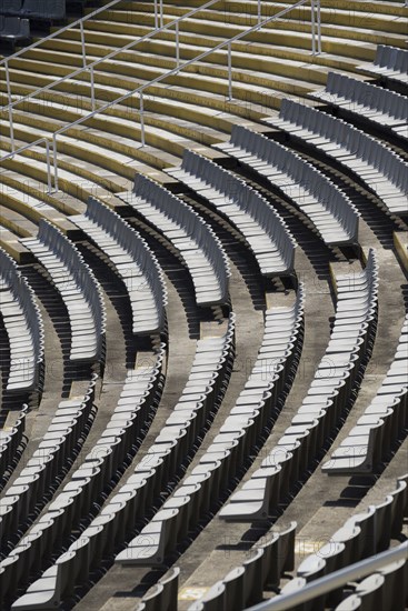 Empty chairs in stadium