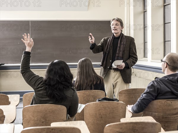 Teacher talking to students in classroom