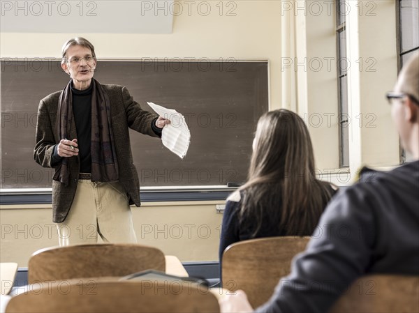 Teacher talking to students in classroom