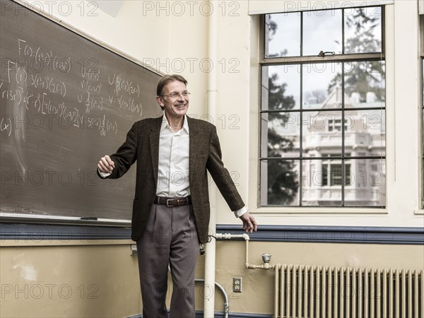 Caucasian teacher talking in classroom