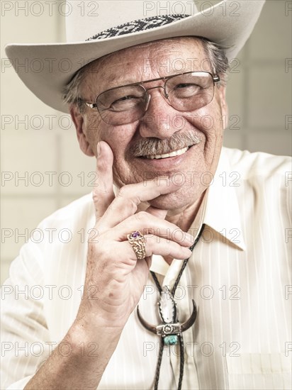 Smiling Caucasian man in cowboy hat