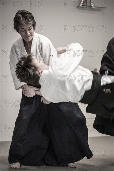 Caucasian people practicing martial arts