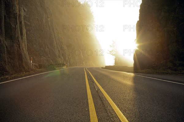 Rural road cutting through mountains