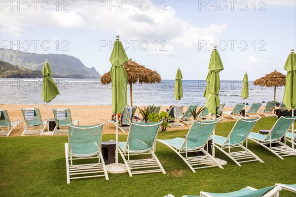 Empty deck chairs on beach