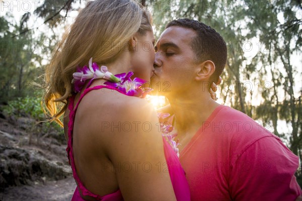 Couple kissing on beach