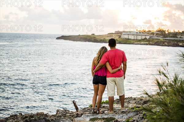 Couple enjoying scenic view of beach