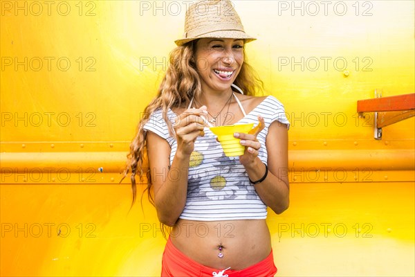 Smiling woman eating shaved ice