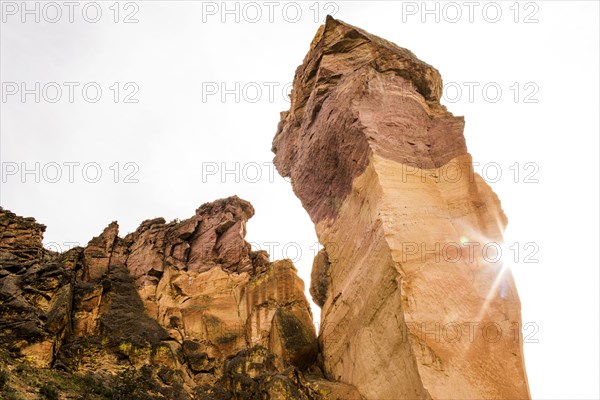 Low angle view of rock formation and cliff