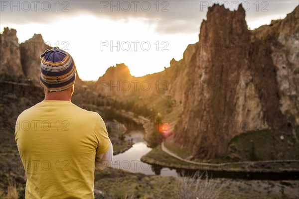 Caucasian man admiring scenic desert landscape