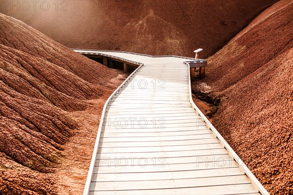 Wooden walkway in desert hills