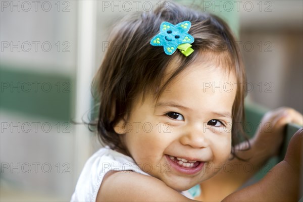 Caucasian baby girl smiling