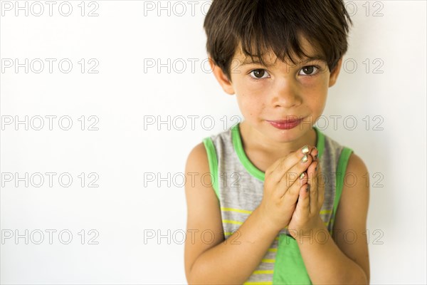 Mixed race boy wearing nail polish