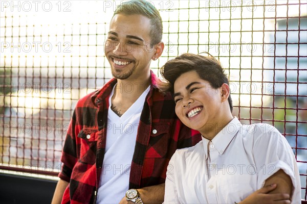 Couple smiling outdoors