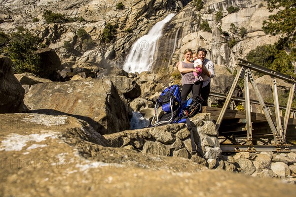 Caucasian family smiling in Yosemite National Park