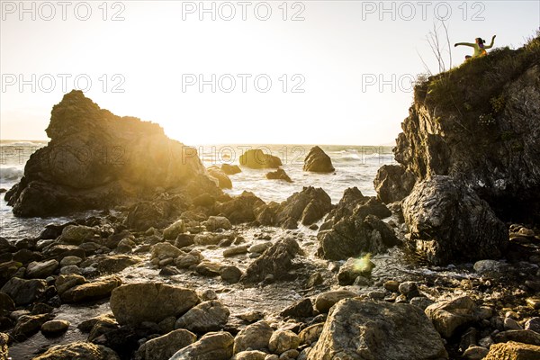 Ocean waves on rocky beach